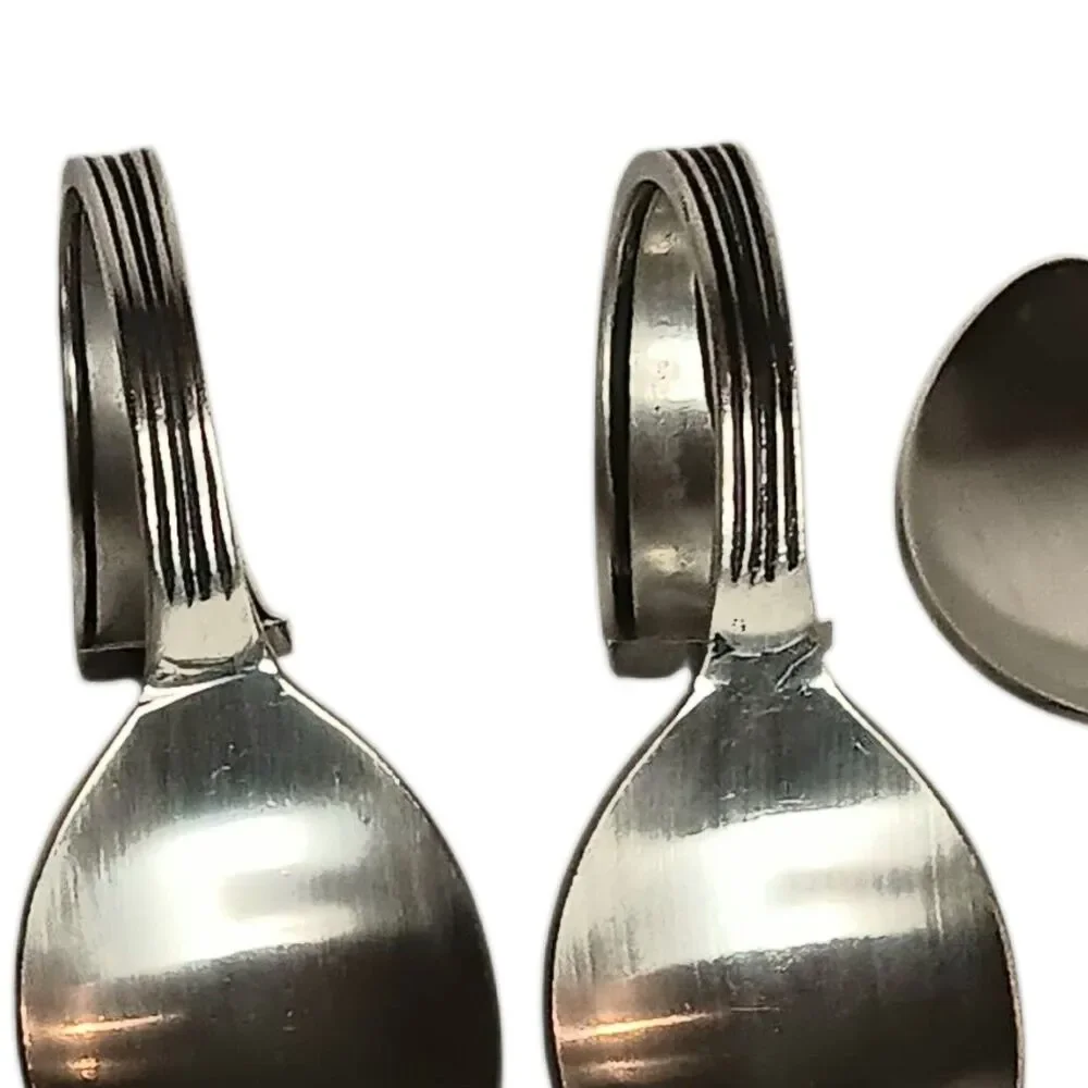 Set Of Four (4) Bent Spoon Napkin Rings Silvertone Paneled Geometric Design